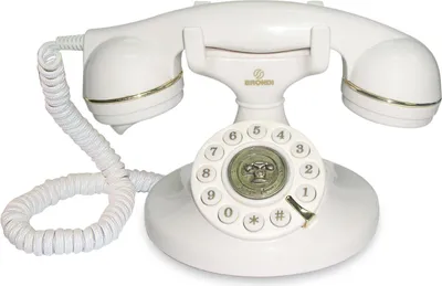 A white vintage rotary dial telephone is shown against a white background.