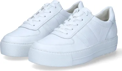 A pair of white leather sneakers.