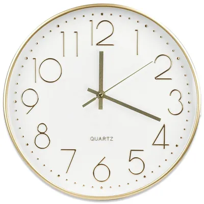 A close-up studio shot of a white and gold analog wall clock.
