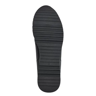 The sole of a black shoe is shown against a white background.
