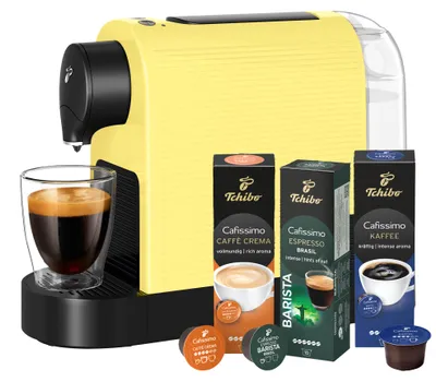 Produktbild von Tchibo Cafissimo „Pure plus“ Kaffeemaschine Kapselmaschine inkl. 30 Kapseln für Caffè Crema, Espresso und Kaffee | 0,8l | 1250 Watt | 11,9 x 33,7 x 24 cm | Limited Edition Lemon Splash