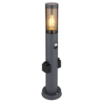 A single outdoor lamp with a motion sensor and two outlets, shown against a white background.