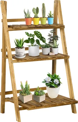 A wooden plant stand with various potted plants on its shelves.