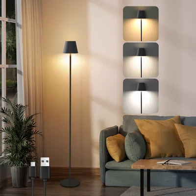A floor lamp is shown in a living room setting next to a sofa and a window.
