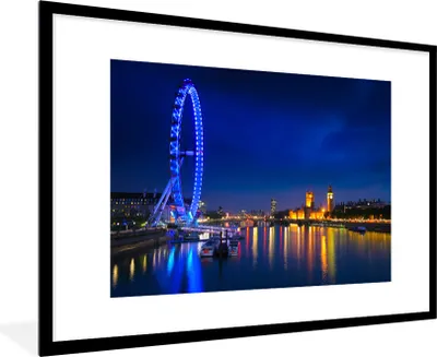Produktbild von MuchoWow® Gerahmtes Poster Bild eines blauen London Eye bei Nacht 90x60 cm - Poster mit Schwarzem Bilderrahmen Wandposter Rahmen Foto Bilder - Wanddekoration - Fotos
