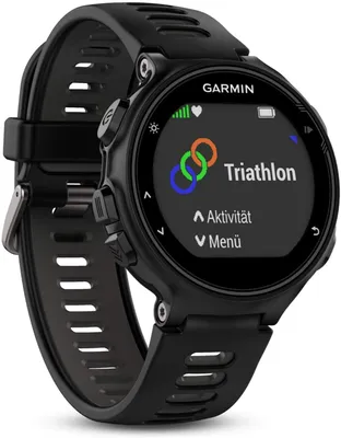 A black Garmin Forerunner 735XT GPS watch is shown against a white background. The watch face displays a triathlon icon and menu options.