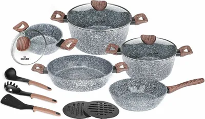 A set of cookware and utensils arranged on a white background.