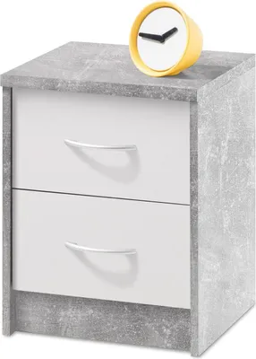A bedside table with two drawers and a small yellow alarm clock on top.