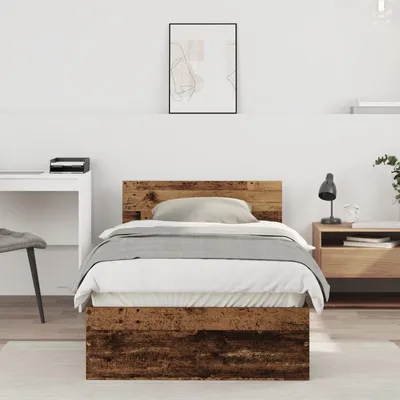 A bedroom scene with a bed, desk, and nightstand.