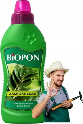 A bottle of plant fertilizer is shown next to a man in a straw hat and overalls, holding a garden tool and giving a thumbs-up.