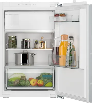 An open refrigerator showing various food items and containers.