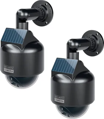 Two black solar-powered security camera replicas are shown against a white background.