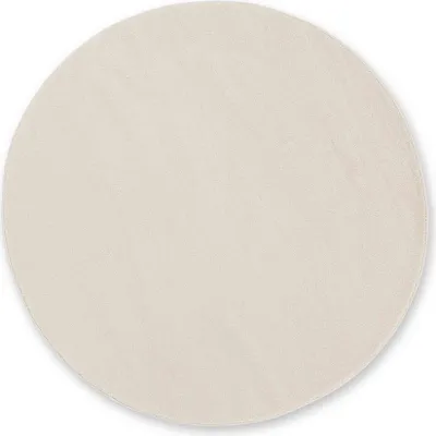 A round, cream-colored rug is shown from a top-down perspective against a white background.