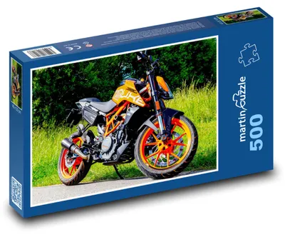 Produktbild von Puzzle 500 Leuchtend orangefarbenes Motorrad - martinpuzzle