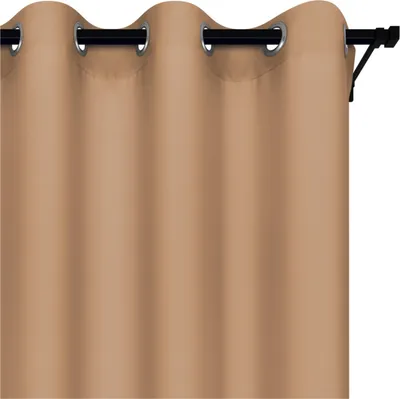 A close-up view of a beige caramel colored curtain with grommets hanging from a black curtain rod.