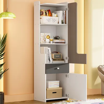 A tall, narrow white bookshelf with a gray drawer and a brown L-shaped door is shown in a room with peach and yellow walls.