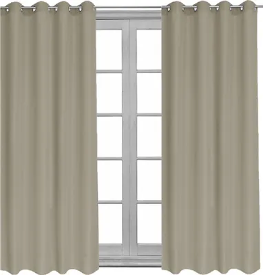 Two light brown curtains are shown hanging in front of a window.