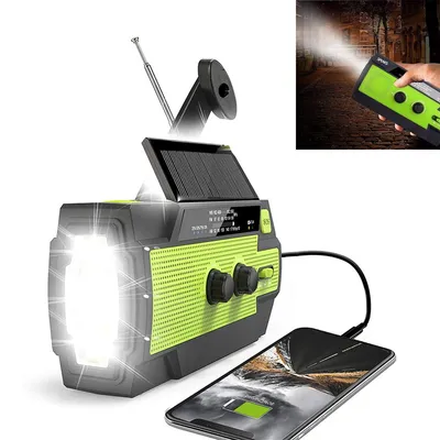 A solar-powered emergency radio with a flashlight and a smartphone charging.