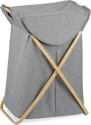 A gray fabric laundry basket with a wooden frame.