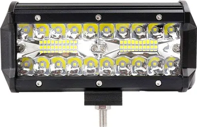 A close-up studio shot of a black LED light bar with multiple yellow LED lights.