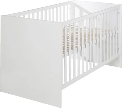 A white wooden crib is shown from a side angle against a white background.