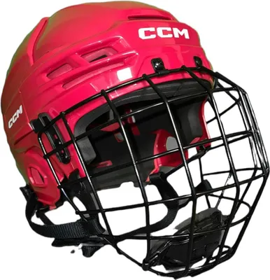 A red CCM Tacks 70 hockey helmet with a black cage.