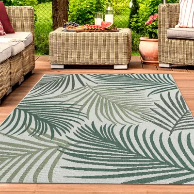 Image de Tapis d'intérieur et d'extérieur aspect sisal, motifs de branches de palmier vertes sur fond sable - Dimensions : 140 x 200 cm