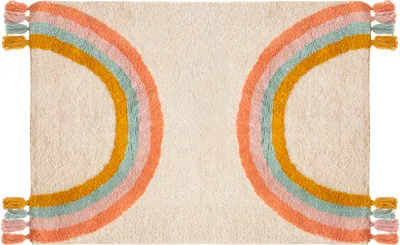 A flat lay image of a rectangular rug with a cream background and a rainbow design on each side.