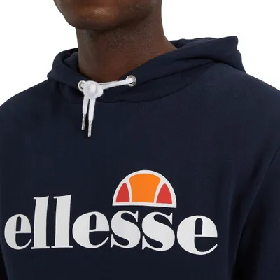 Close-up of a person wearing a navy blue Ellesse hoodie.