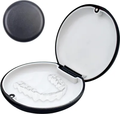 A black and white case for dental retainers, with a clear retainer inside.