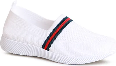 A single white slip-on shoe with a decorative stripe.