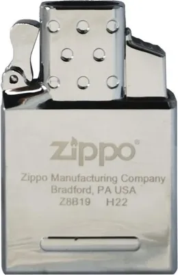 A close-up studio shot of a Zippo lighter insert.