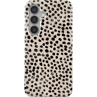 A phone case with a dalmatian-like pattern.
