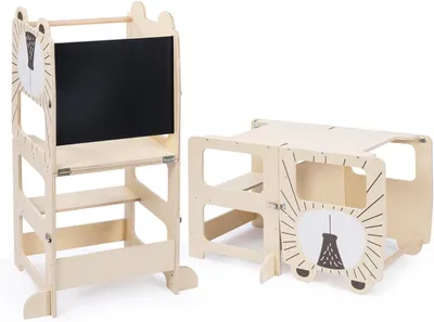 A wooden learning tower and a wooden table/chair set are displayed against a white background.