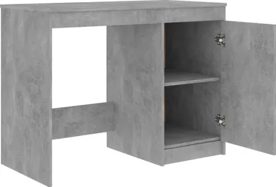 A concrete-effect desk with a cabinet on the right side.