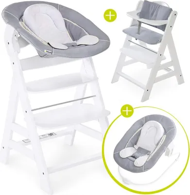 A collage showing a white high chair with a grey newborn insert and a separate grey newborn insert.