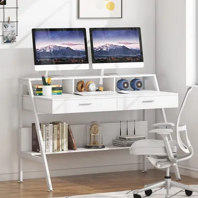 A white desk with dual monitors, shelves, and a chair.