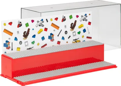 A display case for LEGO bricks with a decorative background and a clear plastic cover.