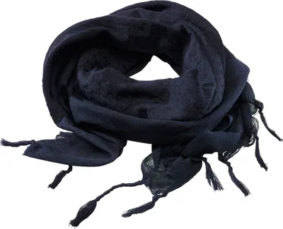 A dark blue scarf with tassels is laid out on a white background.