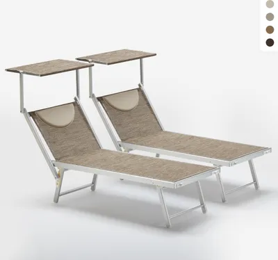 Two beach chairs with sunshades against a white background.