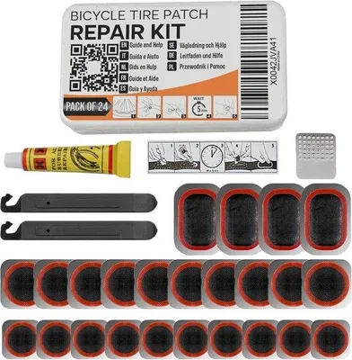 Produktbild von Famanu Reparaturset für Fahrräder – 24-teilig mit Vulkanisierflüssigkeit und Zubehör