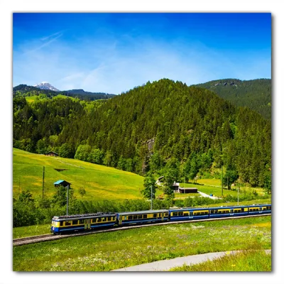 Produktbild von Wallario selbstklebende Möbelfolie/ Tischdecke für Innen und Außen, Größe: 60 x 60 cm - Eisenbahn in einer Sommerlandschaft in der Schweiz