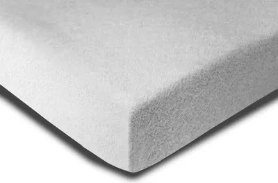 A close-up shot of a white fitted sheet, showing its texture and corner.