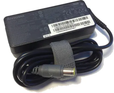 A Lenovo laptop power adapter is shown on a white background.
