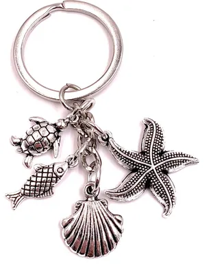 Produktbild von Onwomania Schlüsselanhänger Seestern Muschel Schildkröte Fisch Silber Metall Anhänger Charm