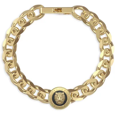 A gold chain bracelet with a circular pendant featuring a lion's head.