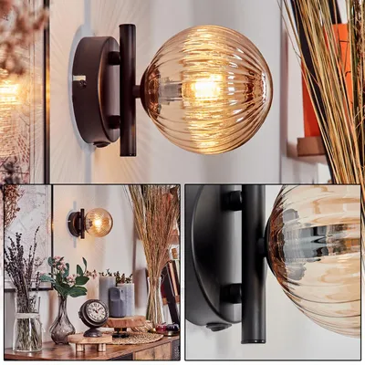 Produktbild von Isorella Wandlampe aus Metall/Riffelglas in Schwarz/Bernstein