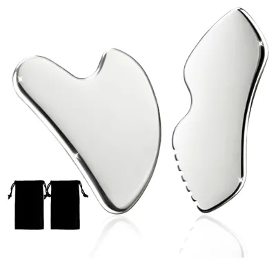 Produktbild von 2er-Set Gua Sha Gesichtsmassagewerkzeug aus Edelstahl mit Aufbewahrungstasche