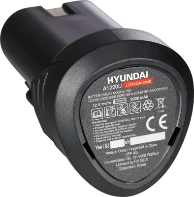 A black Hyundai battery pack is shown in a close-up shot against a light gray background.