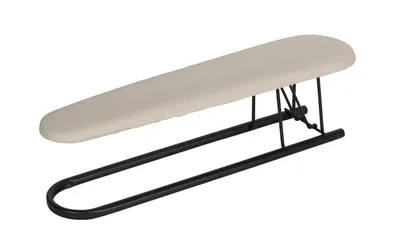 A sleeve ironing board with a beige fabric cover and black metal legs, photographed against a white background.